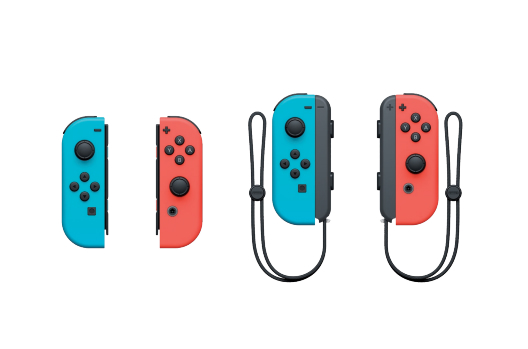 Dos mandos de videojuego. Uno azul y otro rojo, ambos sin correas. Dos mandos con correas negras, también azul y rojo.