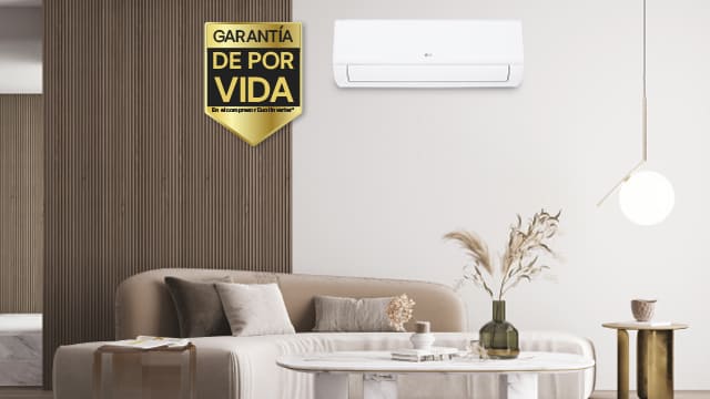 Aire acondicionado LG en salón moderno con garantía de por vida en compresor Dual Inverter, enfocado en durabilidad y sostenibilidad.