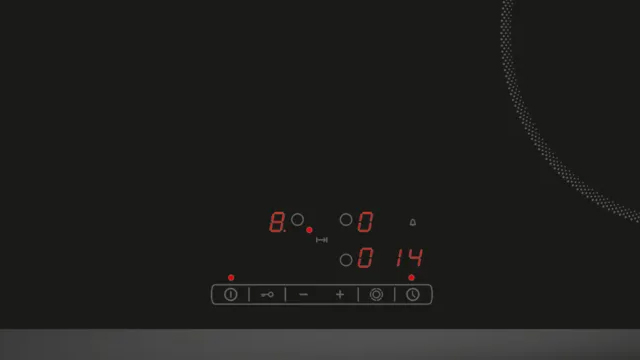 Detalle de mandos de placa activada mostrando potencias de diferentes fuegos. 