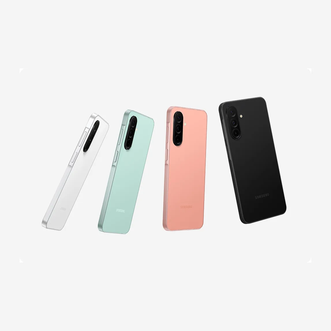 Cuatro teléfonos móviles en blanco, verde, rosa y negro, alineados en diagonal sobre un fondo blanco.