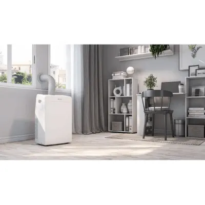 habitación con climatizador blanco