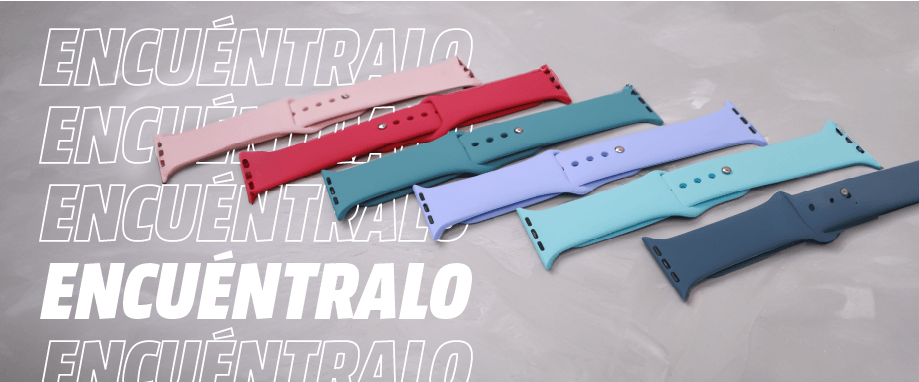 Se ven varias correas de reloj de silicona en rosa, rojo, verde, lila, aguamarina y azul sobre un fondo gris con la palabra "ENCUENTRALO".