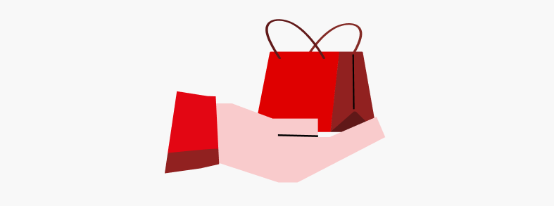 Una mano sostiene una bolsa de compras roja con asas marrones sobre un fondo blanco.