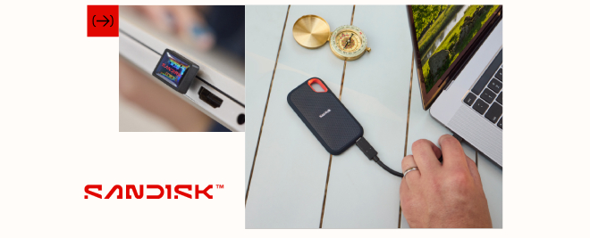 memoria usb tipo c en ordenador y un disco ssd sandisk trabajando con un portatil