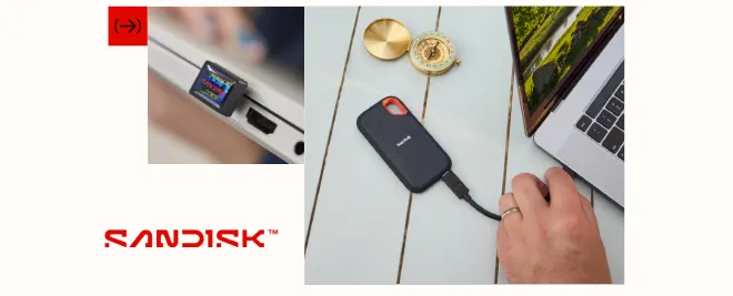 memoria usb tipo c en ordenador y un disco ssd sandisk trabajando con un portatil