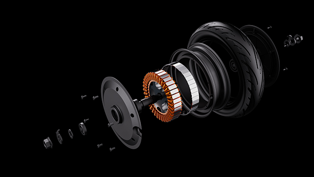 Vista en despiece del motor del patinete, mostrando su estructura interna con bobinas y componentes mecánicos.