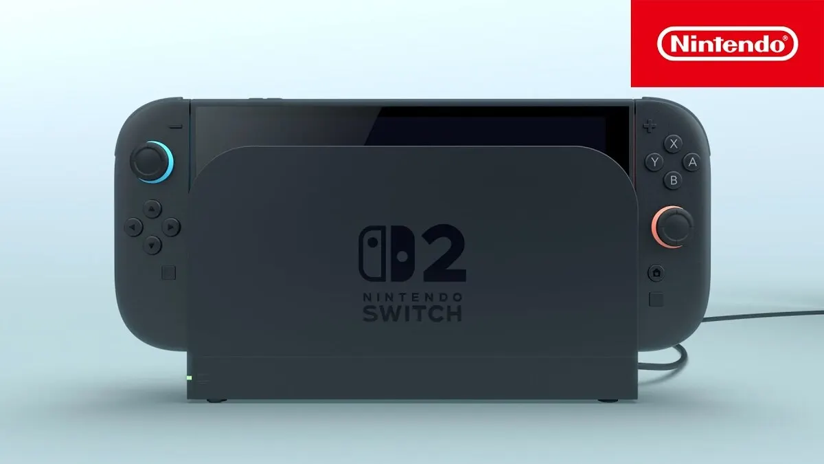 Imagen de la Nintendo Switch 2 en su base de carga, con un diseño renovado en color negro y Joy-Con más grandes.