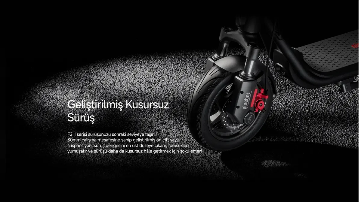 The front wheel and suspension system of a Ninebot electric scooter are visible against a black background. The red brake details are particularly striking.