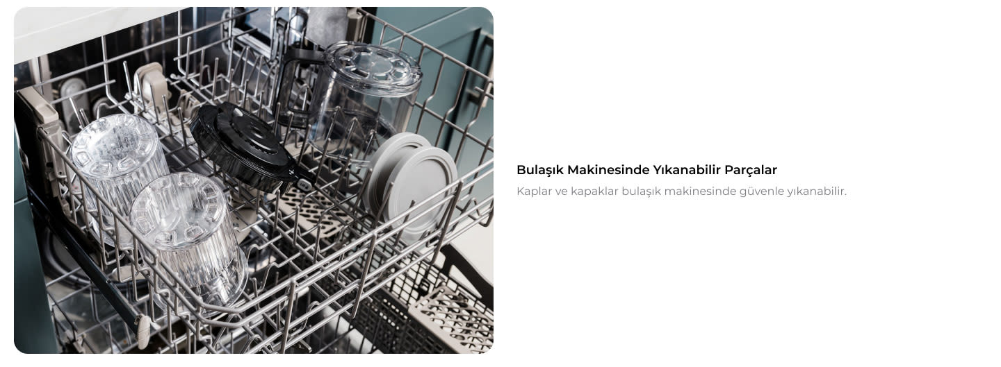 Bula��k makinesinin i&ccedil;inde bardak, kapak ve tabak gibi mutfak e�yalar� metal raflara yerle�tirilmi�.